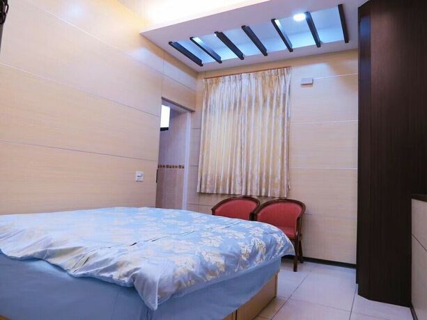 Imagen de la habitación del Hotel Lvyou BandB. Foto 19
