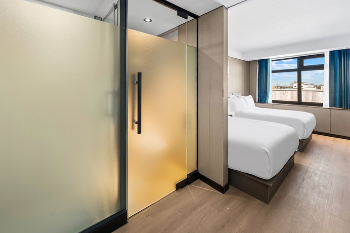 Imagen de la habitación del Hotel Ly New York. Foto 14