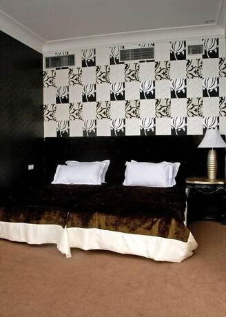 Imagen de la habitación del Hotel Lybid Plaza. Foto 12