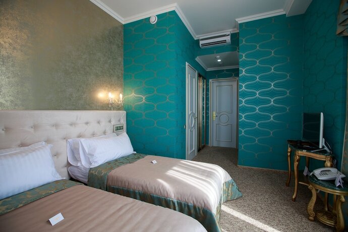 Imagen de la habitación del Hotel Lybid Plaza. Foto 18