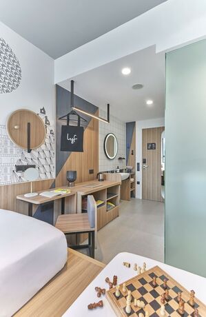 Imagen de la habitación del Hotel Lyf Farrer Park Singapore. Foto 18