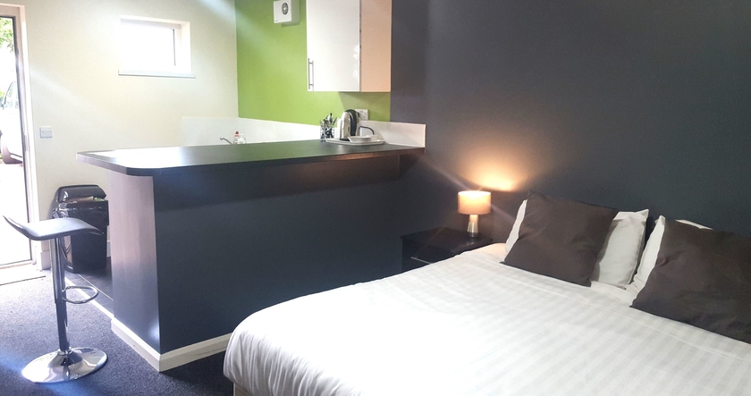 Imagen de la habitación del Hotel Lymedale Suites. Foto 7