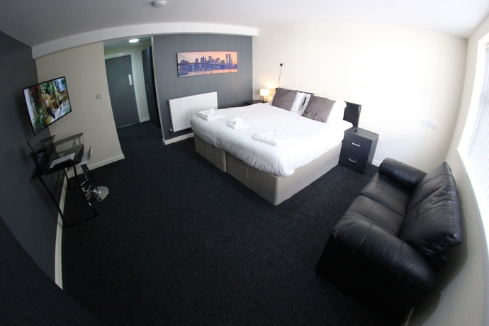 Imagen de la habitación del Hotel Lymedale Suites. Foto 11