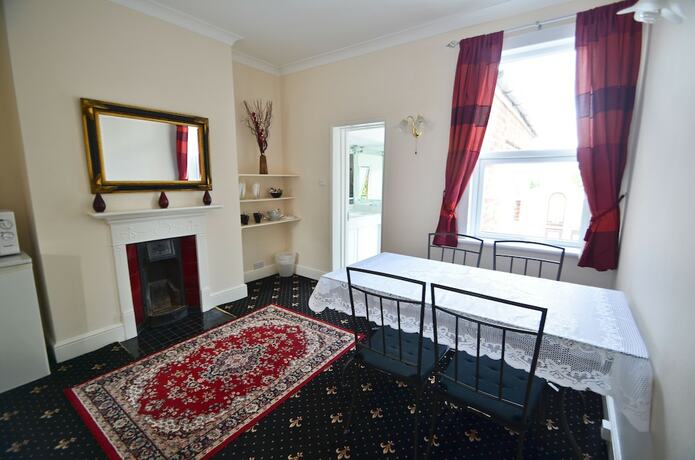 Imagen de la habitación del Hotel Lyndricks House. Foto 12