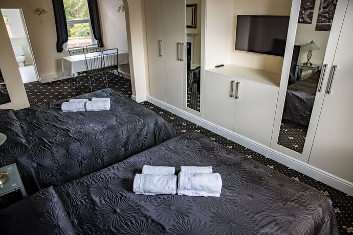 Imagen de la habitación del Hotel Lyndricks House. Foto 13