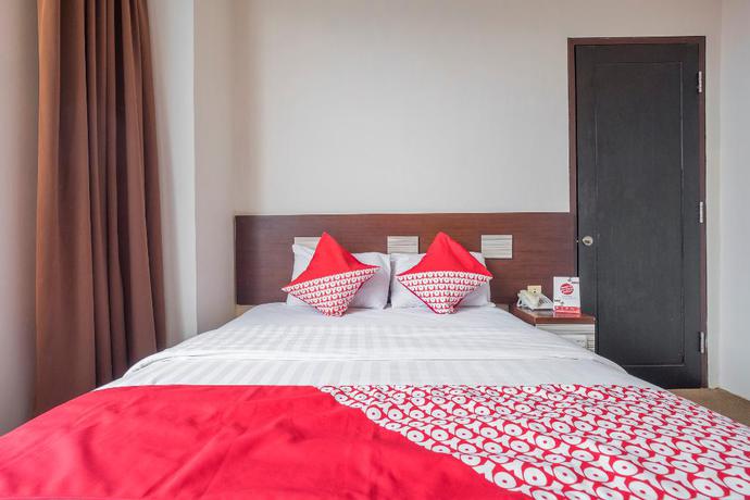 Imagen de la habitación del Hotel Lynt Hotel Makassar. Foto 12