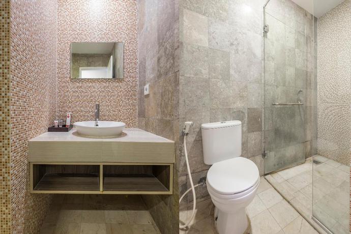 Imagen de la habitación del Hotel Lynt Hotel Makassar. Foto 16