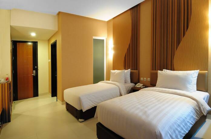 Imagen de la habitación del Hotel Lynt Jakarta. Foto 20