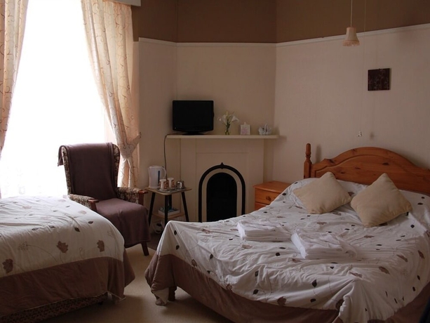 Imagen de la habitación del Hotel Lynton House. Foto 9