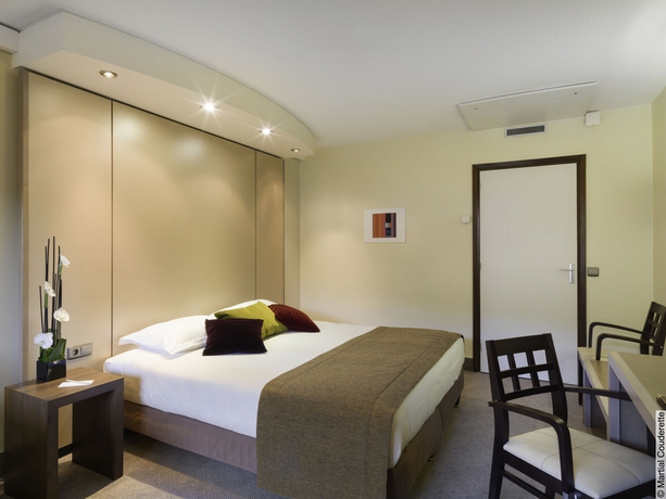 Imagen de la habitación del Hotel Lyon Métropole. Foto 5