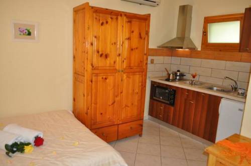 Imagen de la habitación del Hotel Lysistrata Bungalows. Foto 5