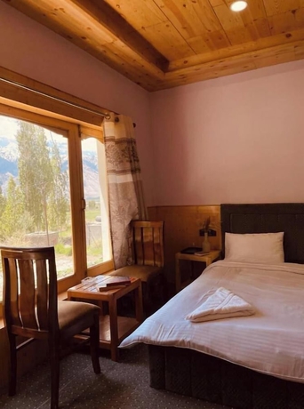 Imagen de la habitación del Hotel Lzawa Residency. Foto 7