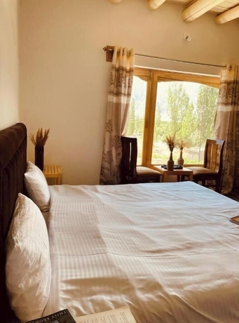 Imagen de la habitación del Hotel Lzawa Residency. Foto 9