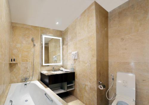 Imagen de la habitación del Hotel M Bahalap Palangka Raya. Foto 9