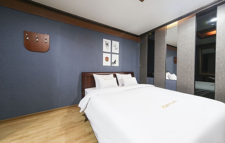Imagen de la habitación del Hotel M Boss Motel. Foto 8