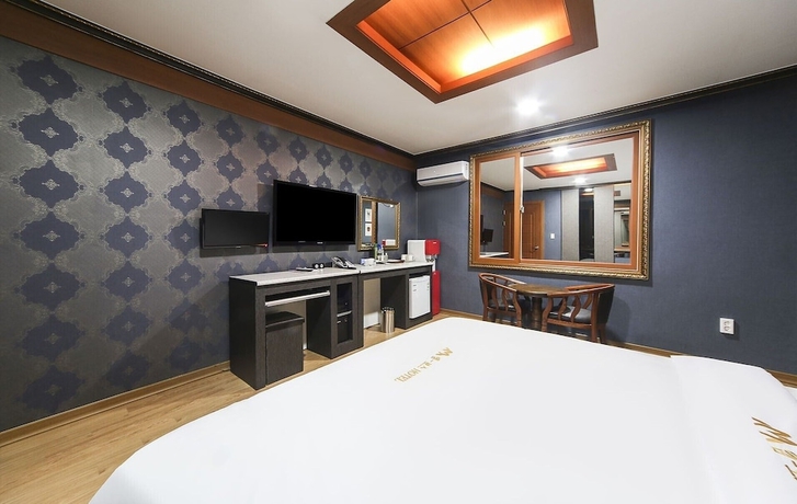 Imagen de la habitación del Hotel M Boss Motel. Foto 9