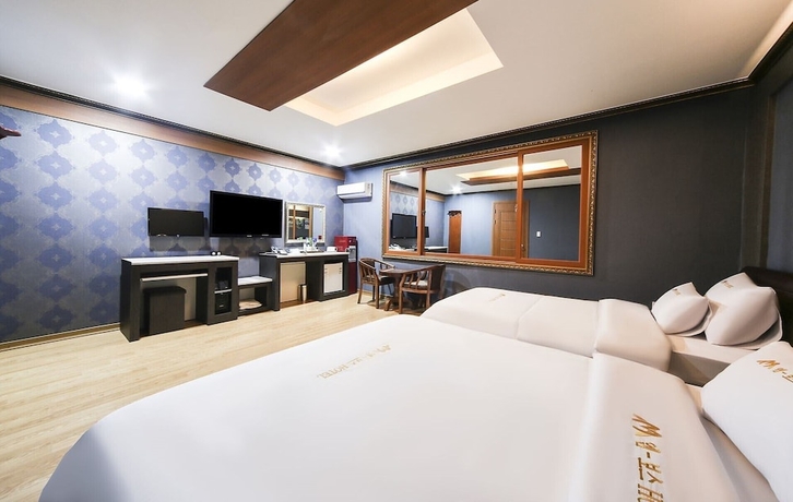 Imagen de la habitación del Hotel M Boss Motel. Foto 12