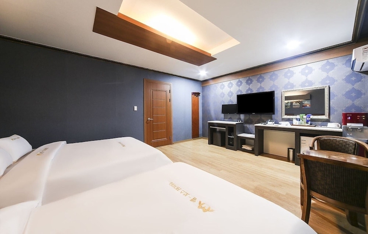 Imagen de la habitación del Hotel M Boss Motel. Foto 13