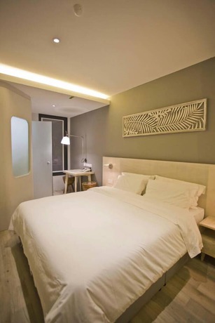 Imagen de la habitación del Hotel M+ Boutique. Foto 11