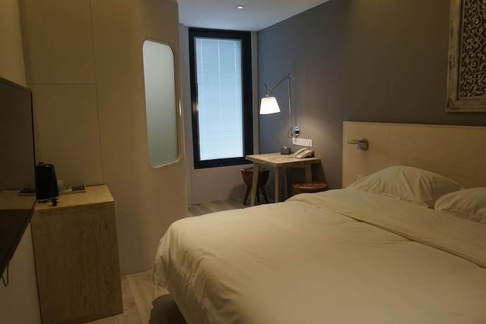 Imagen de la habitación del Hotel M+ Boutique. Foto 17