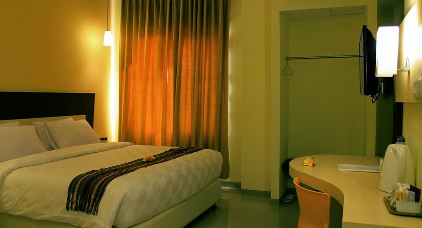 Imagen de la habitación del Hotel M, Cakranegara Utara. Foto 6