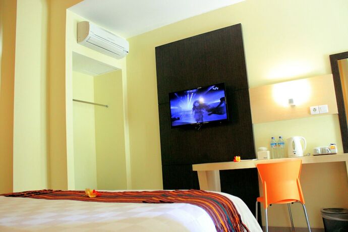 Imagen de la habitación del Hotel M, Cakranegara Utara. Foto 9