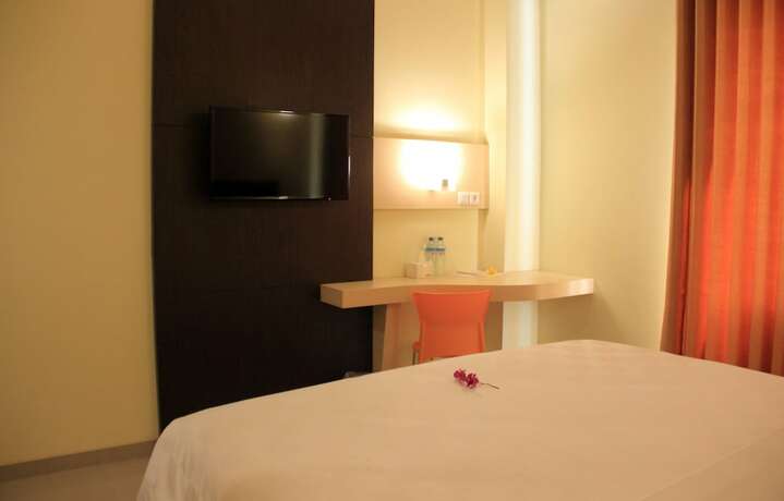 Imagen de la habitación del Hotel M, Cakranegara Utara. Foto 12