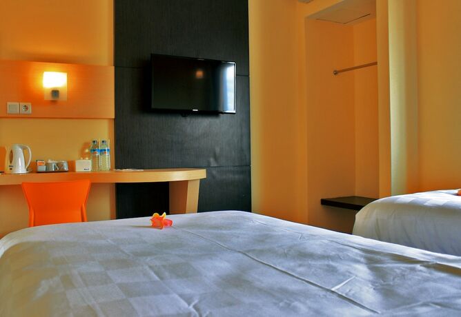 Imagen de la habitación del Hotel M, Cakranegara Utara. Foto 14
