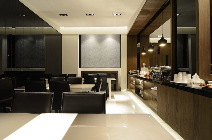 Imagen del bar/restaurante del Hotel M, Caotun. Foto 2