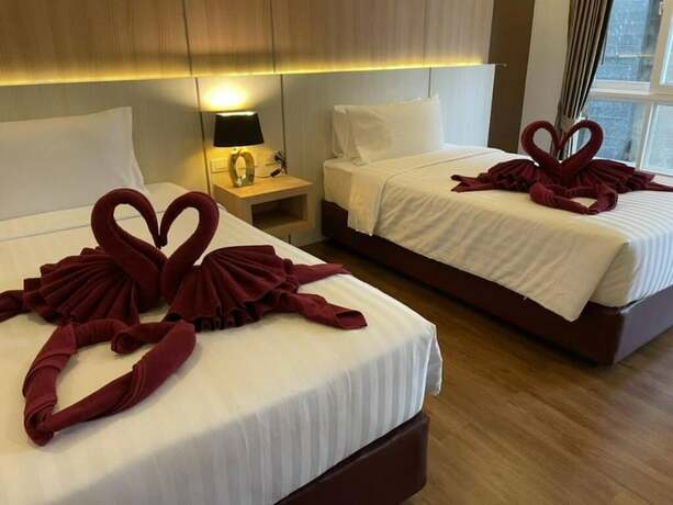 Imagen de la habitación del Hotel M Casa Pattaya. Foto 7