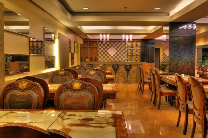 Imagen del bar/restaurante del Hotel M Chereville. Foto 3