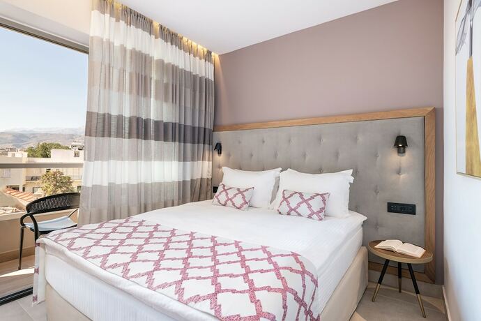 Imagen de la habitación del Hotel M City. Foto 17