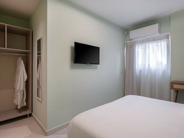 Imagen de la habitación del Hotel M City. Foto 19