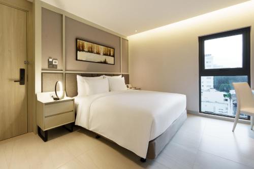Imagen de la habitación del Hotel M City Saigon. Foto 2