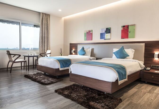 Imagen de la habitación del Hotel M Crown. Foto 14