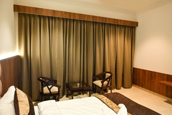Imagen de la habitación del Hotel M D Farms And Resorts. Foto 5