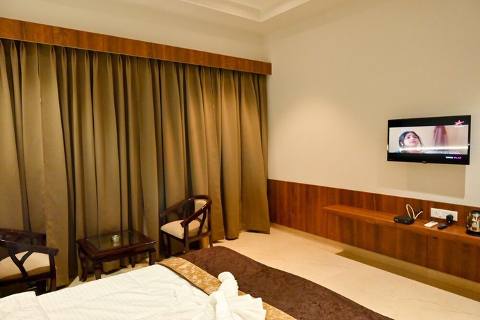 Imagen de la habitación del Hotel M D Farms And Resorts. Foto 6