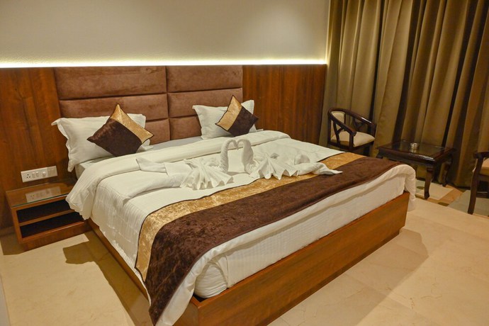 Imagen de la habitación del Hotel M D Farms And Resorts. Foto 7