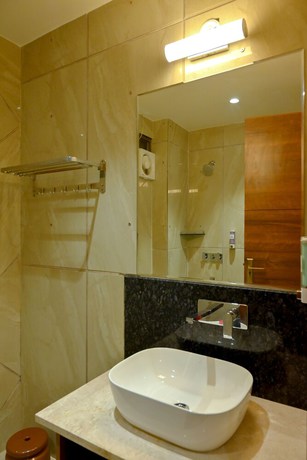 Imagen de la habitación del Hotel M D Farms And Resorts. Foto 8