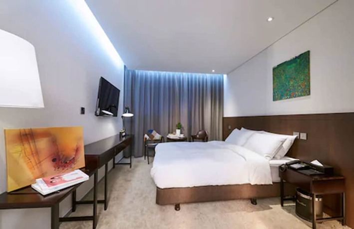 Imagen de la habitación del Hotel M Felice. Foto 12