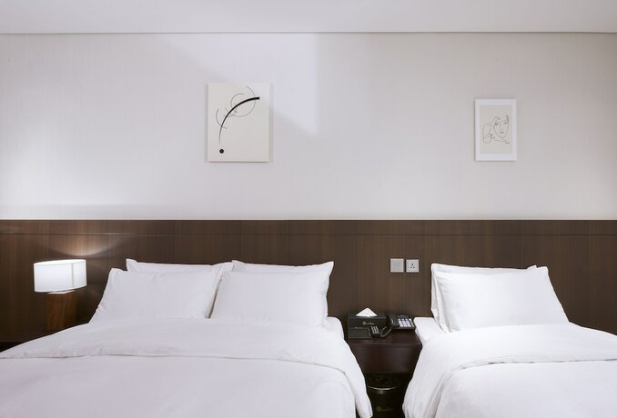 Imagen de la habitación del Hotel M Felice. Foto 16