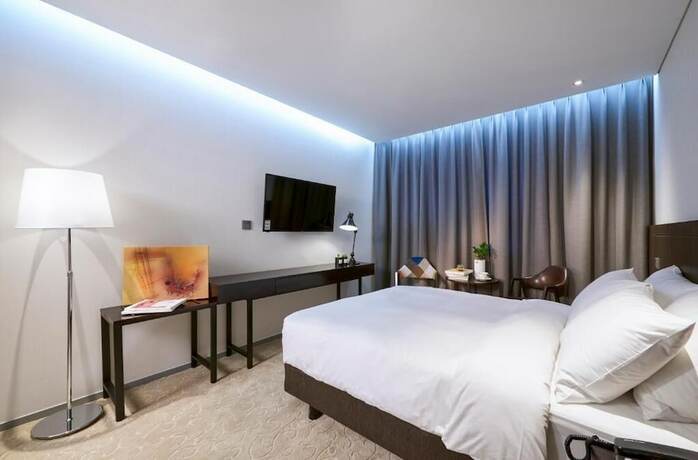 Imagen de la habitación del Hotel M Felice. Foto 25