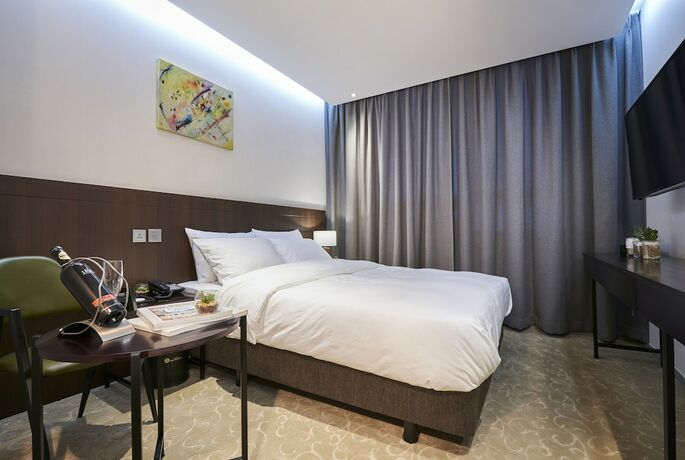 Imagen de la habitación del Hotel M Felice. Foto 26