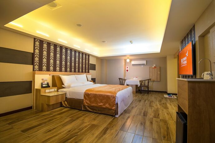 Imagen de la habitación del Hotel M Garden Business. Foto 27