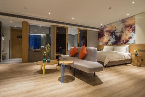 Imagen de la habitación del Hotel M Hotel Zhengzhou. Foto 8