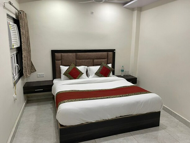 Imagen de la habitación del Hotel M K Grand. Foto 7