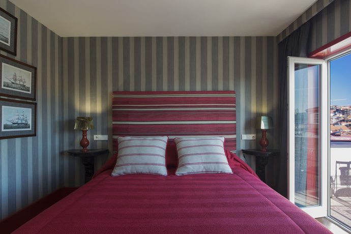 Imagen de la habitación del Hotel M Maison Particulière Porto. Foto 6
