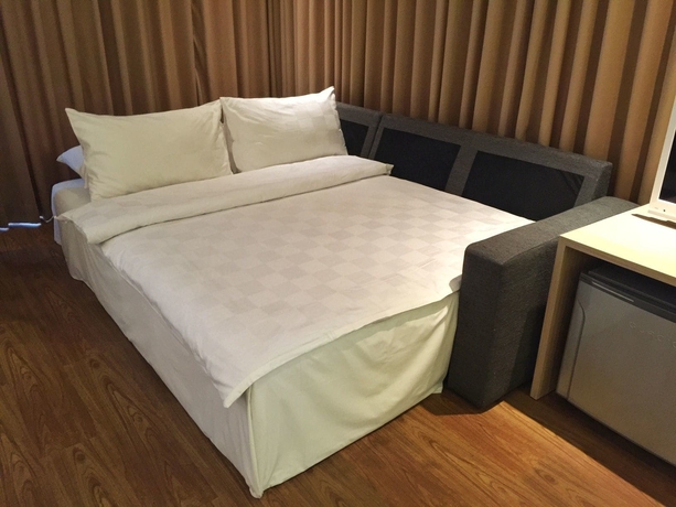 Imagen de la habitación del Hotel M Premiere. Foto 11