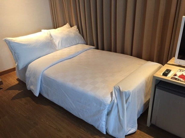 Imagen de la habitación del Hotel M Premiere. Foto 12