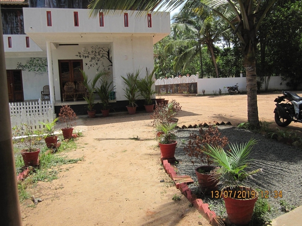 Imagen de la habitación del Hotel M R Beach and Cottages. Foto 4